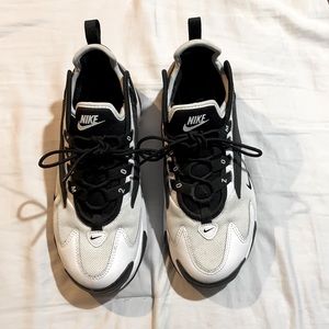 Black and White Nike tennis shoes.